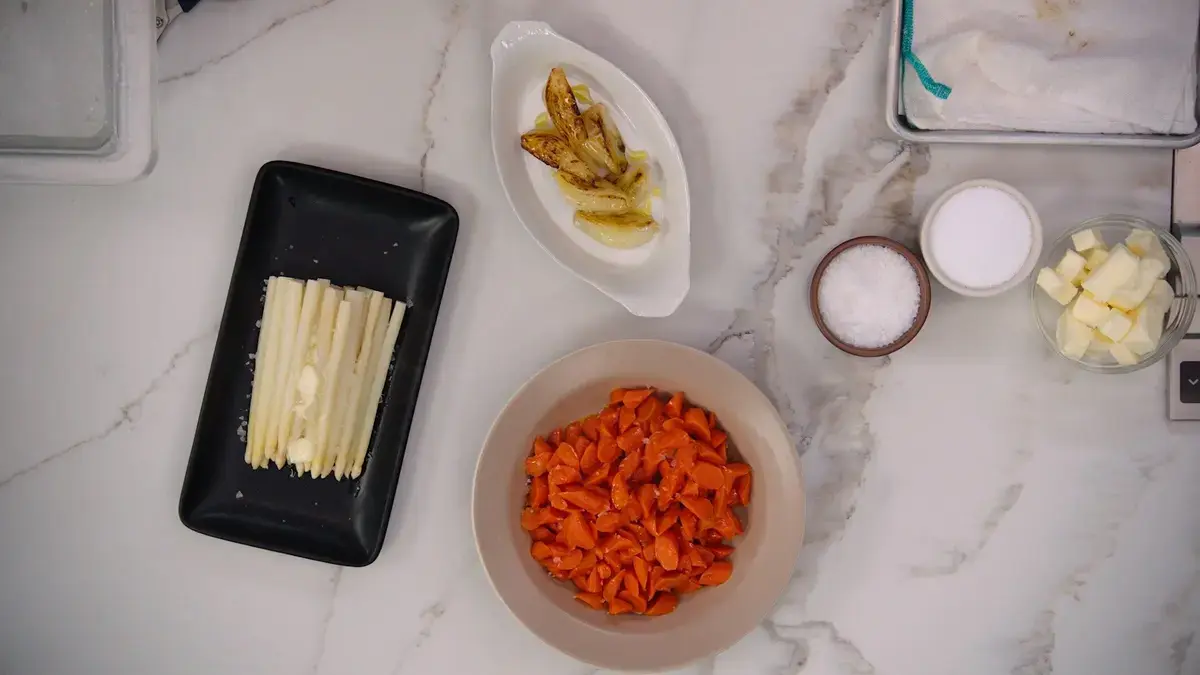 Glazing carrots and braising artichokes